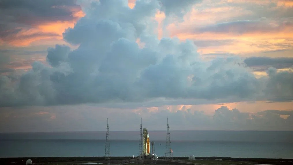 distant photo of Artemis rocket on launch pad